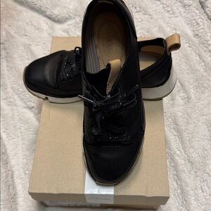 Clarks Women's Black Sneakers with Tan Pull Tab and White Sole